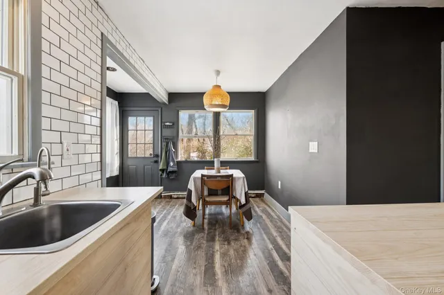a view of a bathroom from a hallway