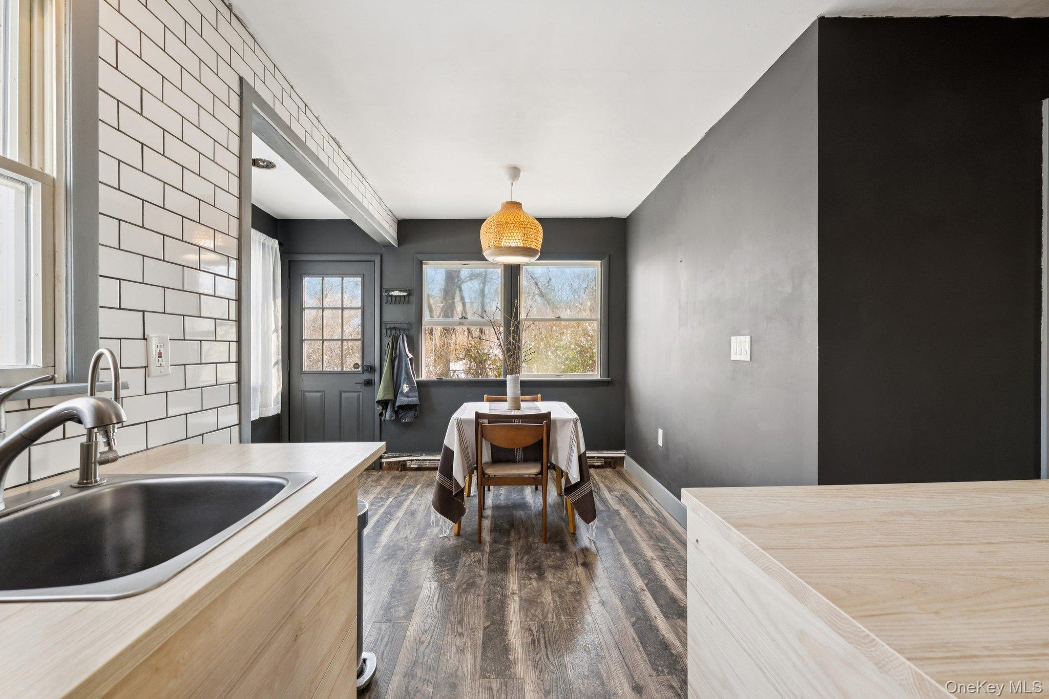 176 Maple Avenue South Flanders, NY 11901 - Photo 16 of 40 a kitchen with a sink and a refrigerator