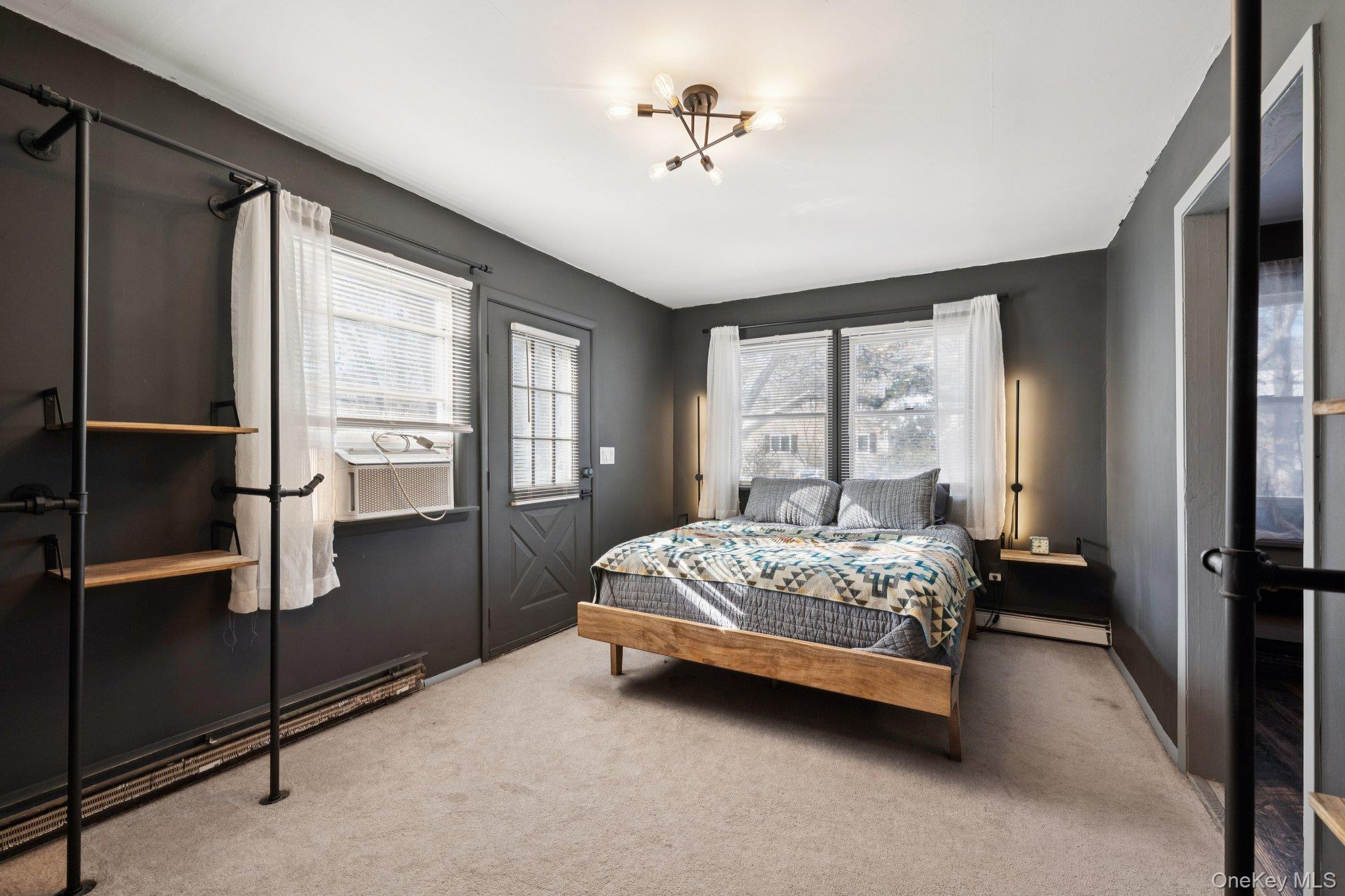 176 Maple Avenue South Flanders, NY 11901 - Photo 23 of 40 a bedroom with a bed and a window