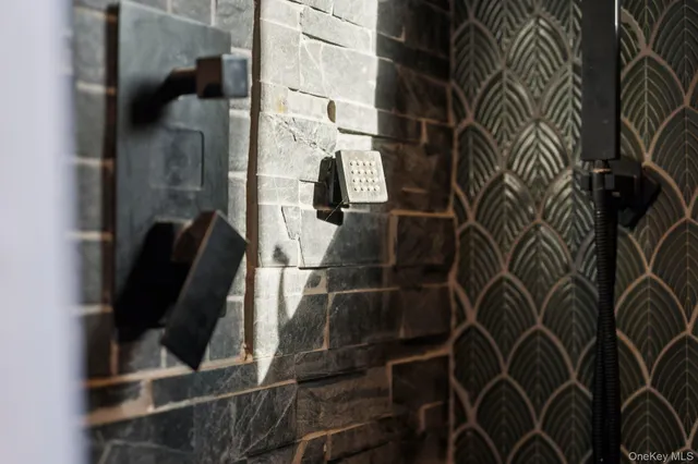 a bathroom with a sink and a shower