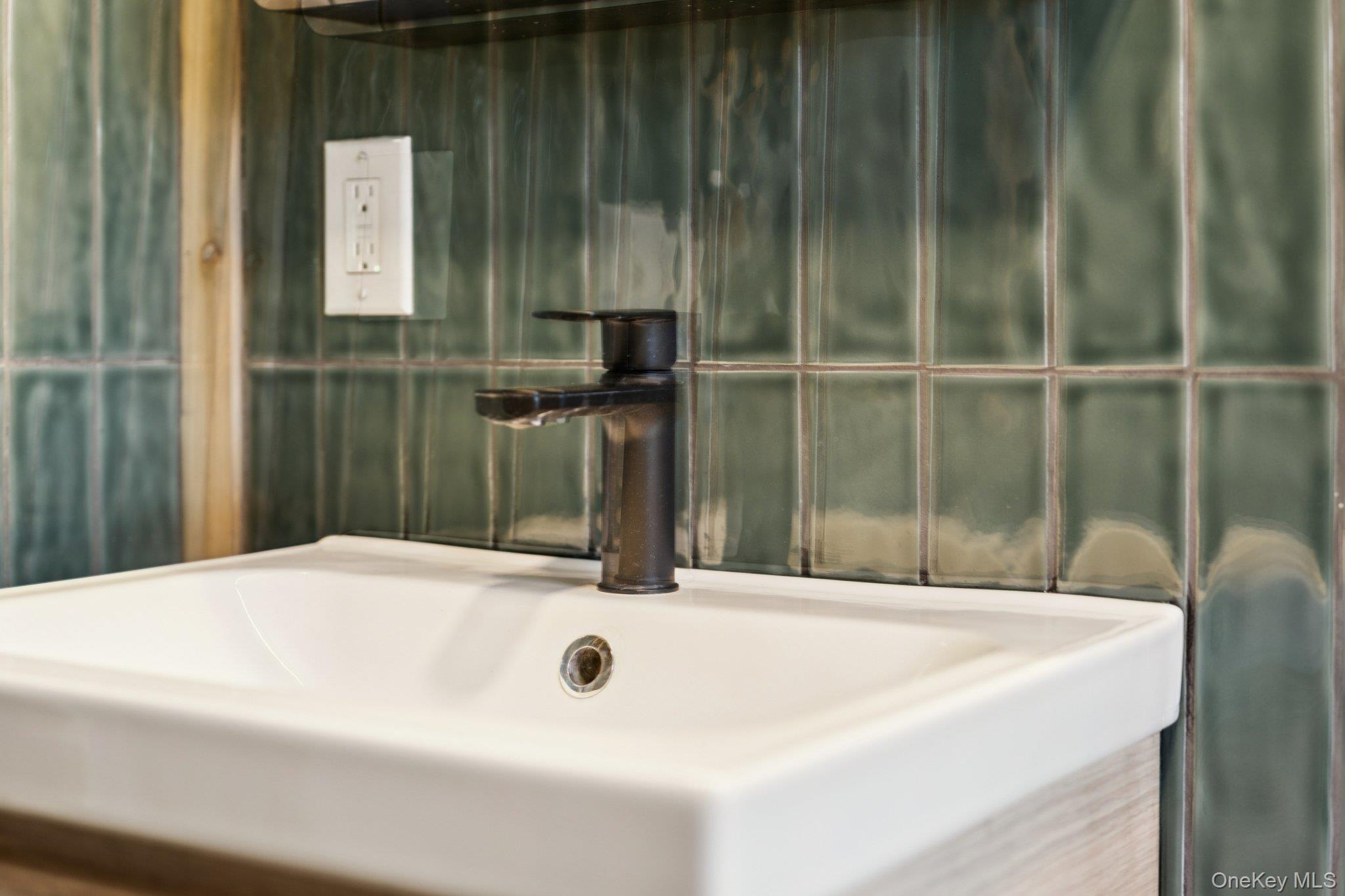 176 Maple Avenue South Flanders, NY 11901 - Photo 28 of 40 a bathroom with a tub