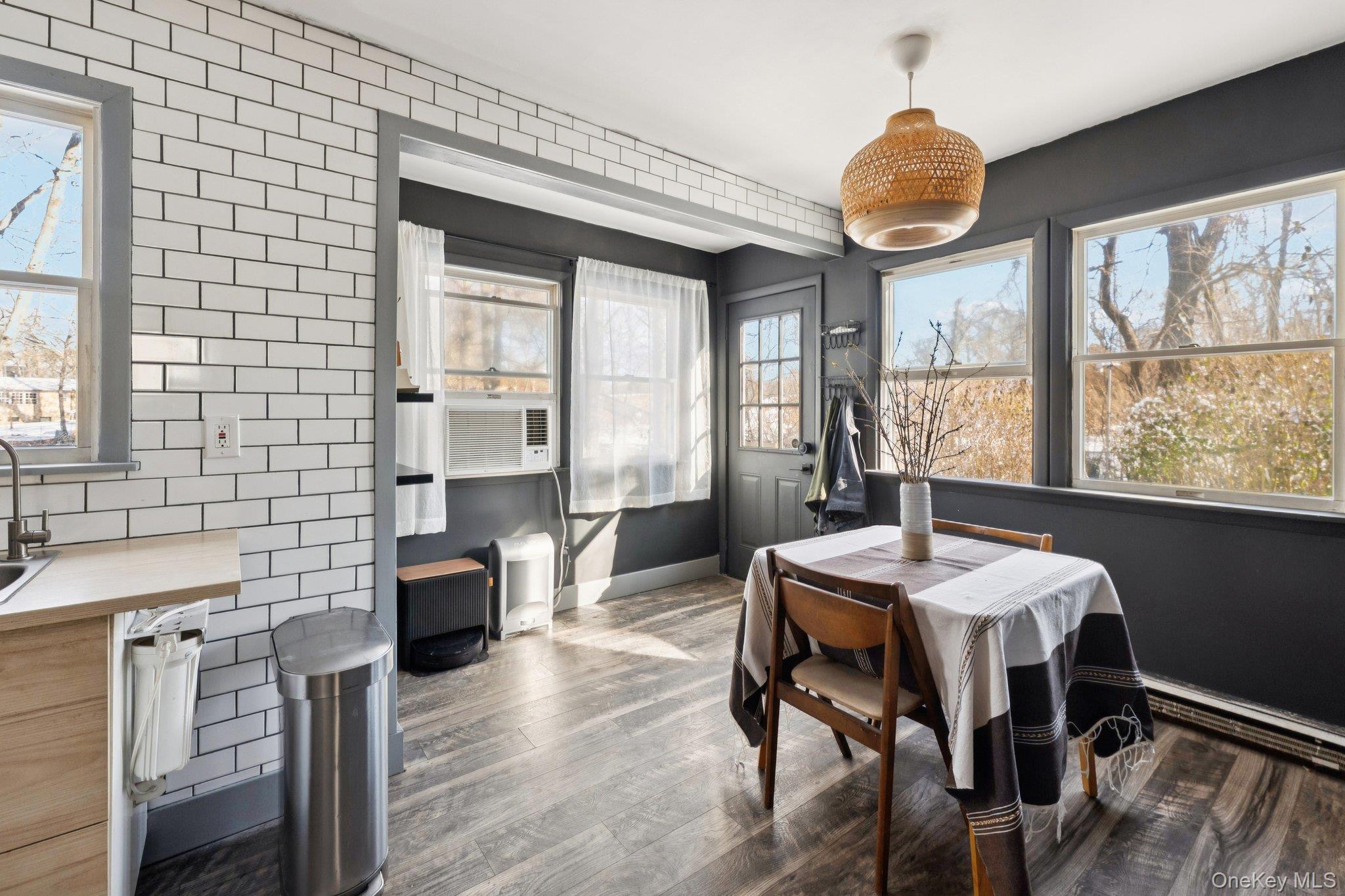 176 Maple Avenue South Flanders, NY 11901 - Photo 8 of 40 a view of a dining room with furniture window and wooden floor