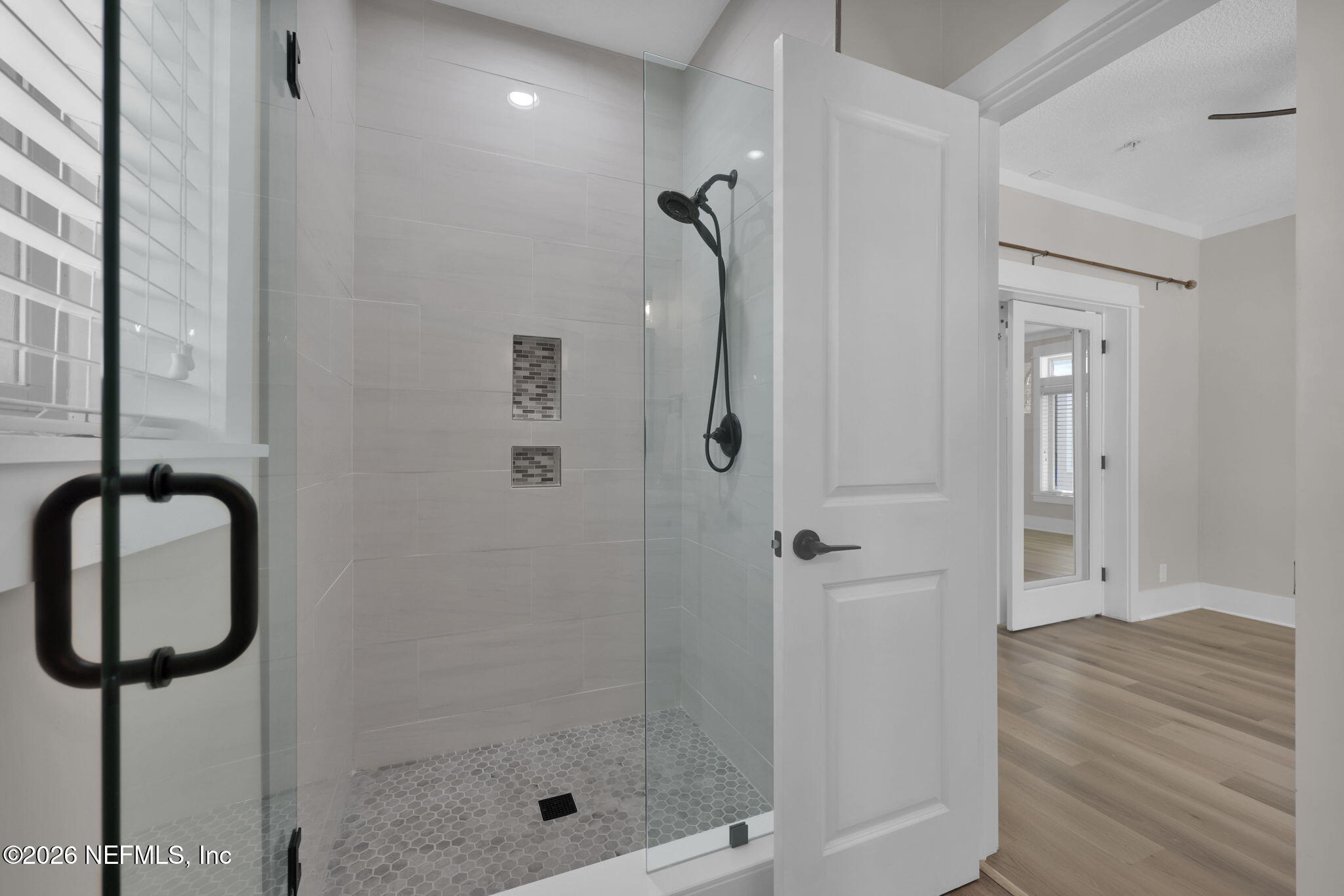339 Ahern Street, Unit 4 Atlantic Beach, FL 32233 - Photo 18 of 47 a bathroom with a shower