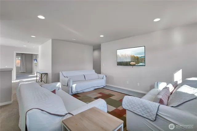 a living room with furniture and a couch