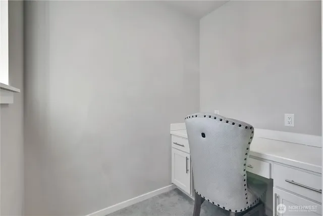 a bedroom with a bed and a cabinets