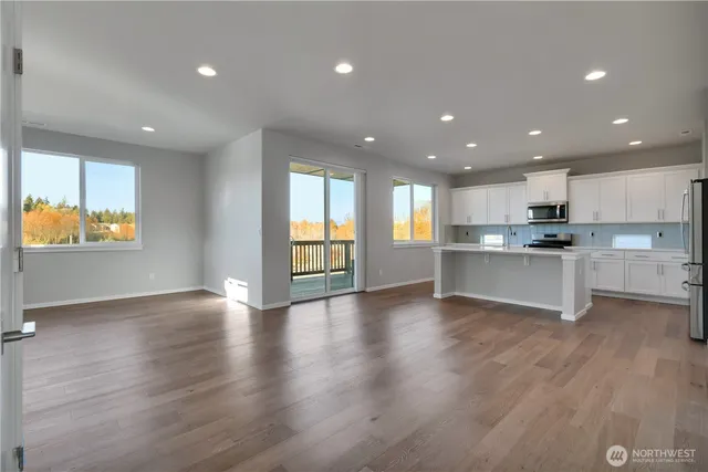a view of kitchen with wooden floor