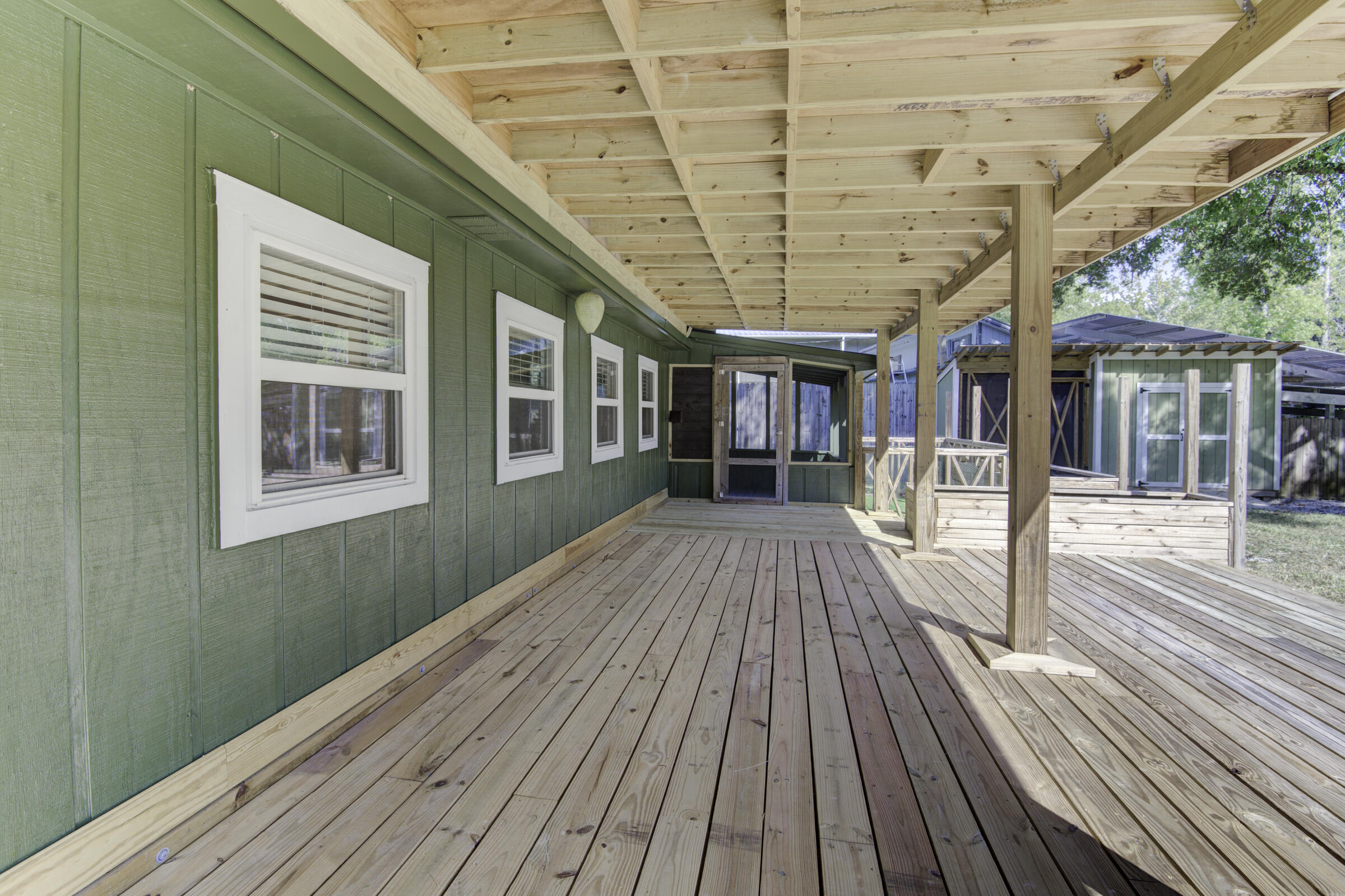 85 Our Street Vernon, FL 32462 - Photo 21 of 66 a view of outdoor space with wooden floor and iron stairs