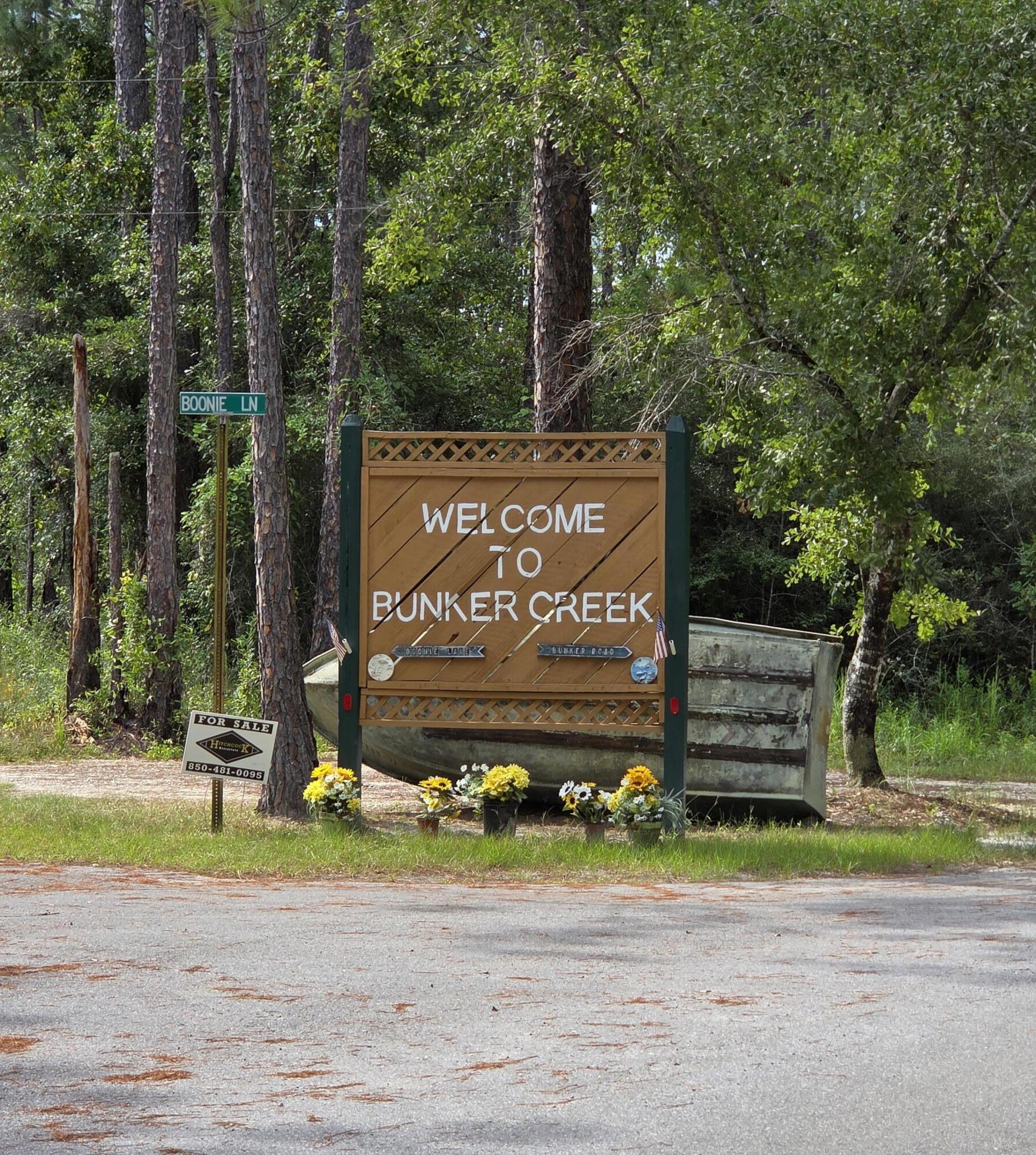 85 Our Street Vernon, FL 32462 - Photo 3 of 66 a sign that is sitting on the side of a road