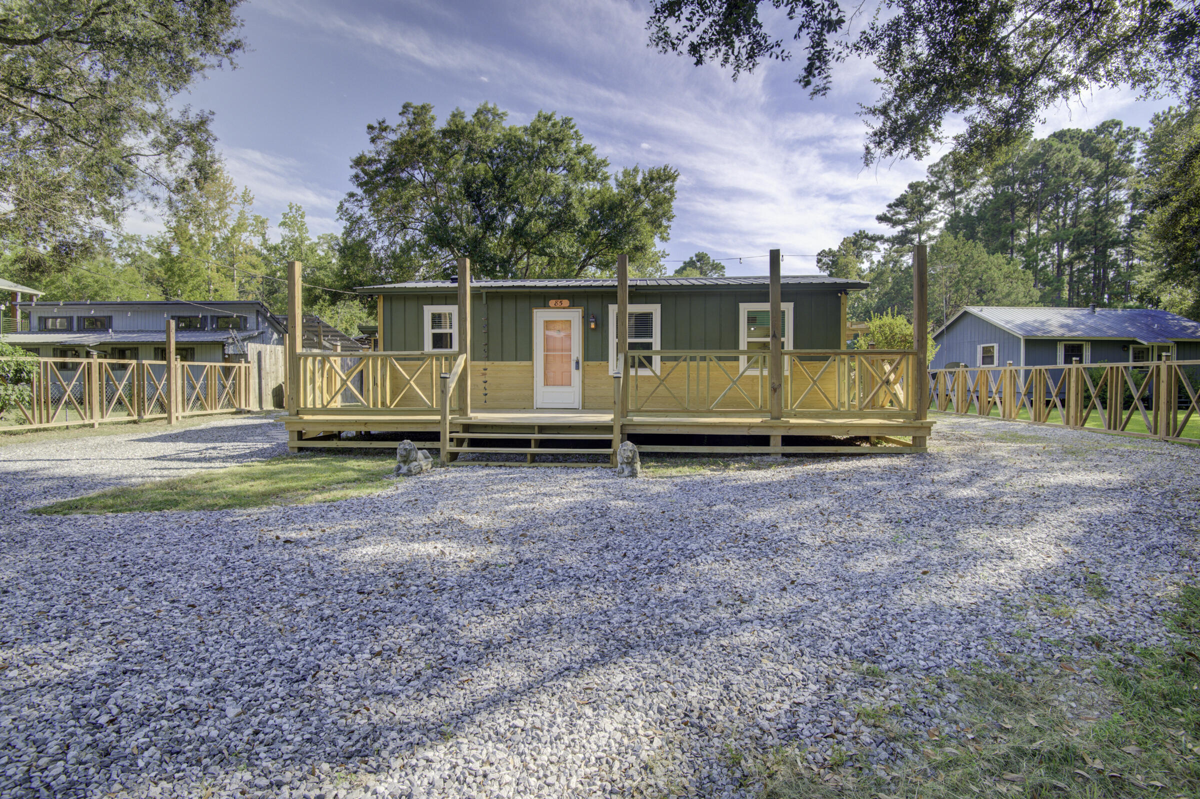 85 Our Street Vernon, FL 32462 - Photo 5 of 66 a view of a house with backyard and trees