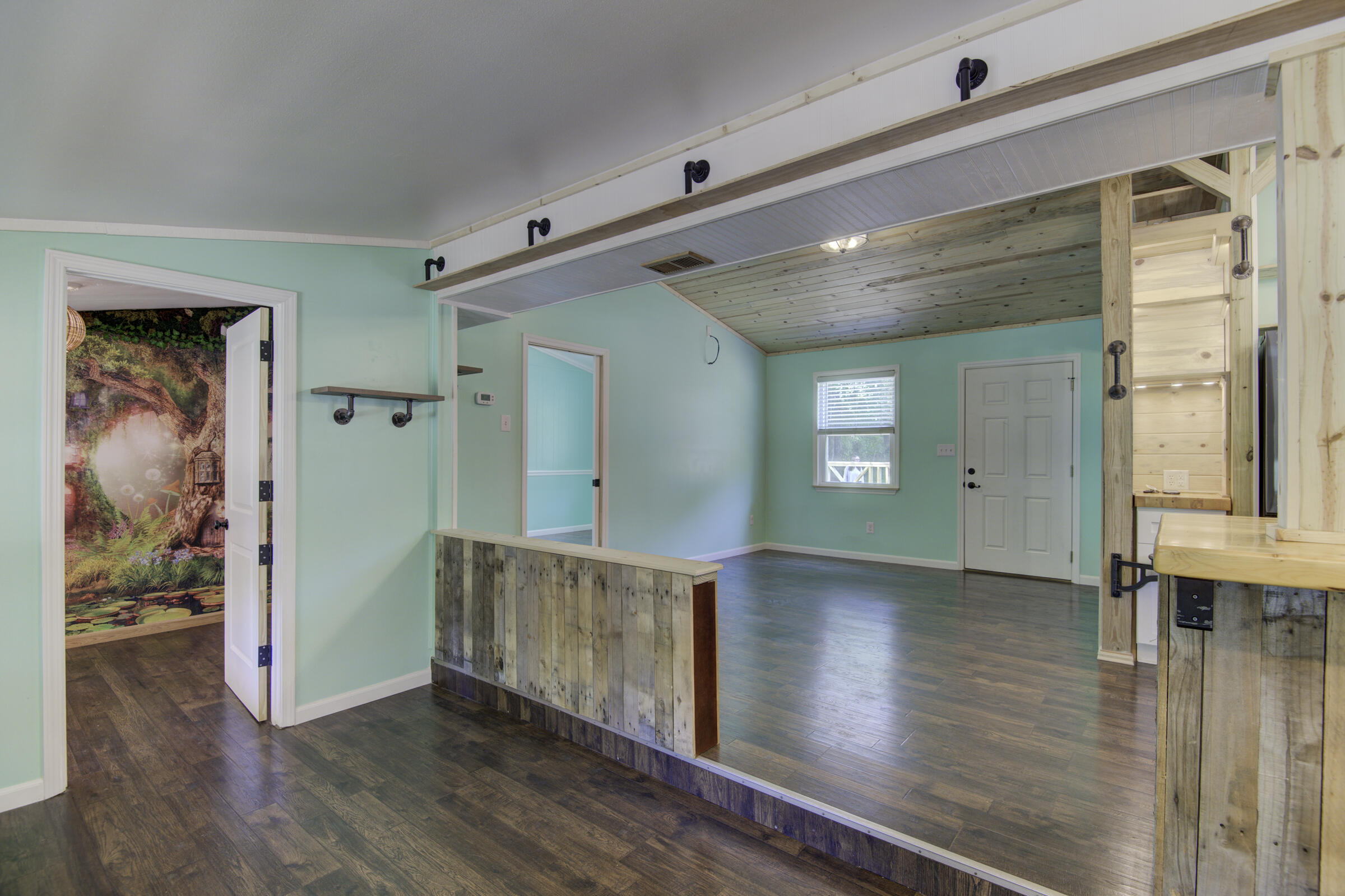 85 Our Street Vernon, FL 32462 - Photo 51 of 66 wooden floor in a hall with an entryway