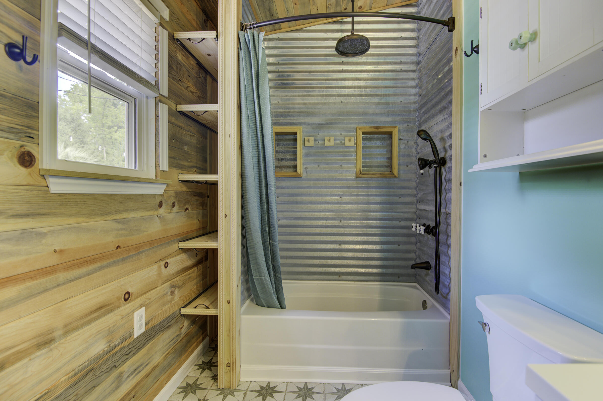 85 Our Street Vernon, FL 32462 - Photo 54 of 66 a bathroom with a sink and bathtub