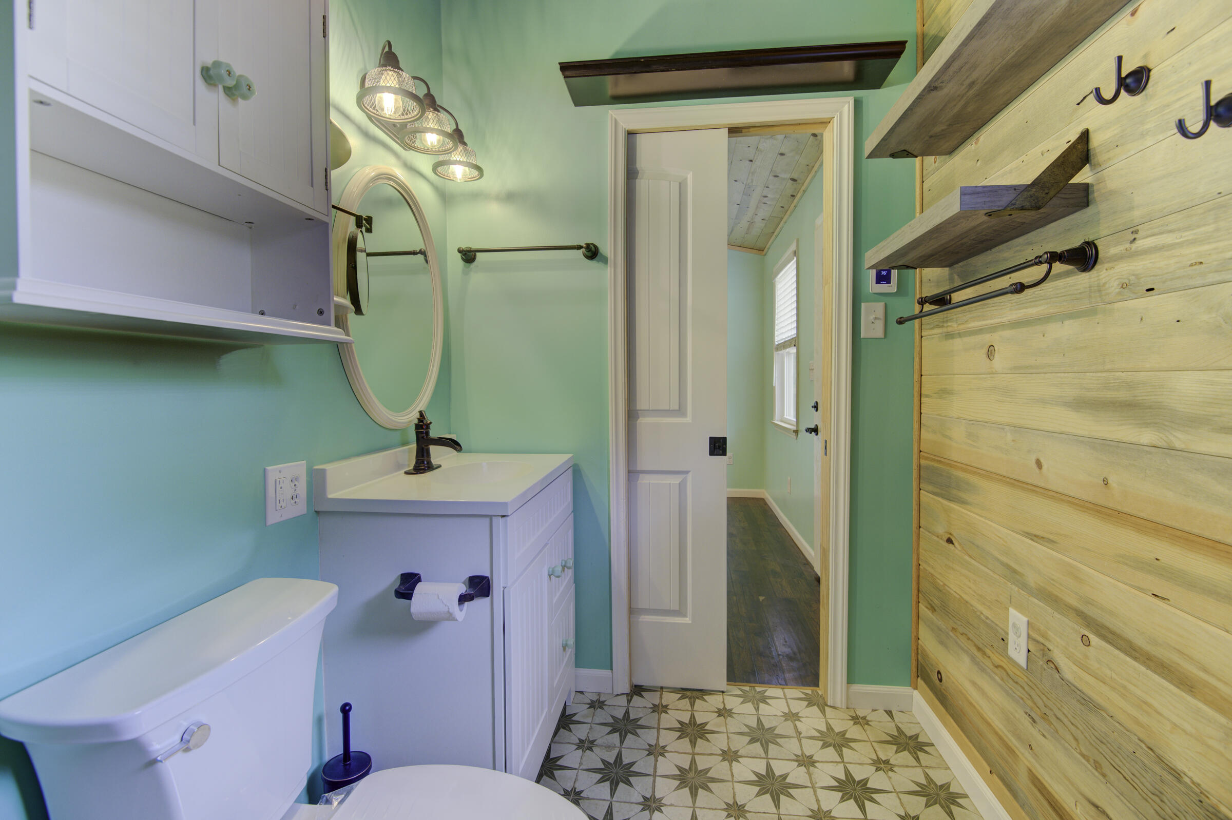 85 Our Street Vernon, FL 32462 - Photo 56 of 66 a bathroom with a sink a toilet and shower