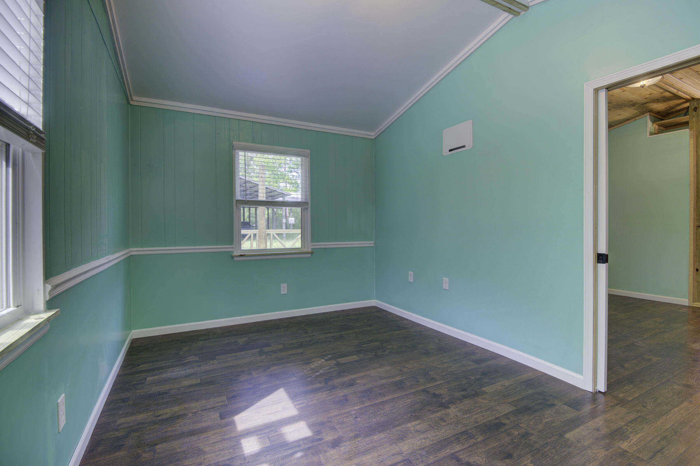 85 Our Street Vernon, FL 32462 - Photo 57 of 66 a view of empty room with window and entryway