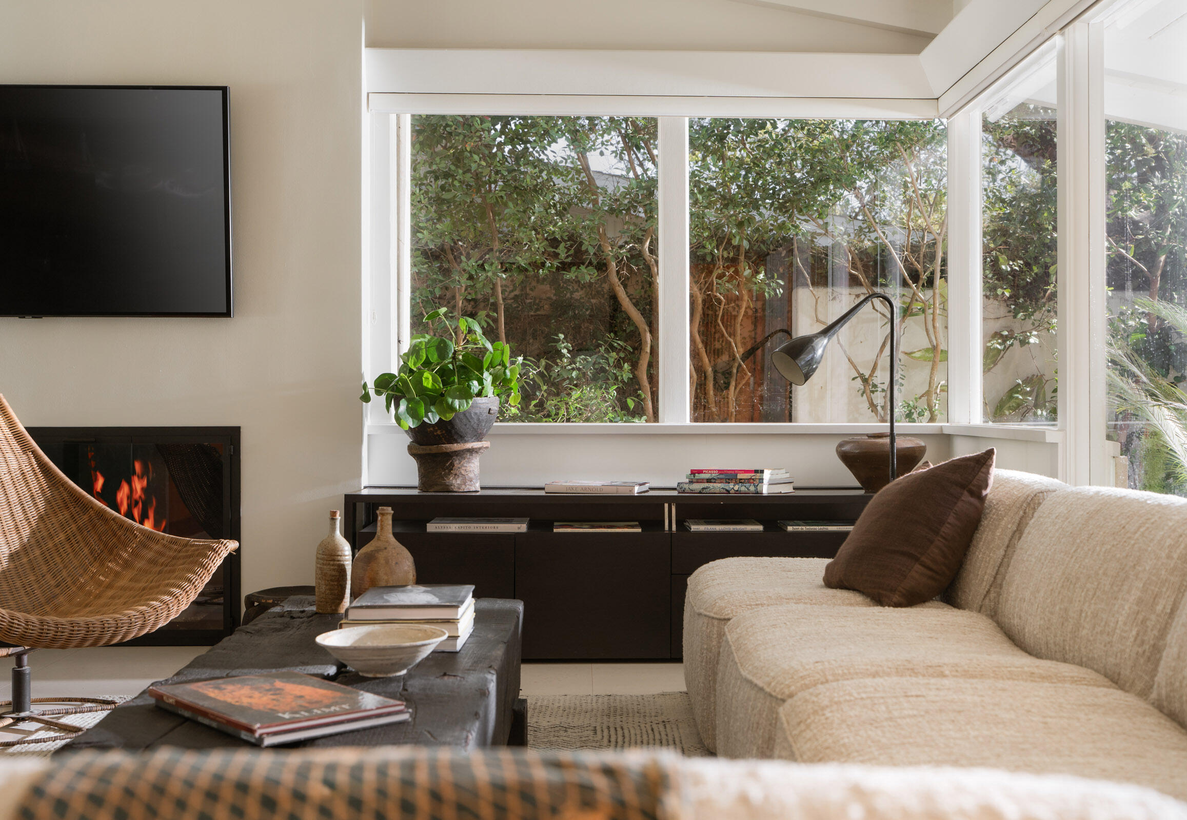 1134 Hill Road Montecito, CA 93108 - Photo 4 of 25 a living room with furniture and a flat screen tv