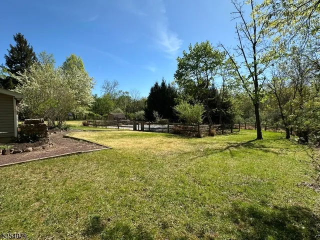 a view of a swimming pool with an outdoor space