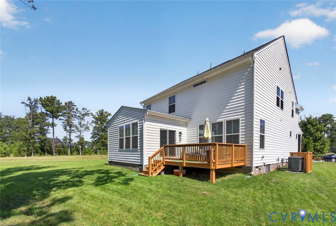 7507 Rouseaux Circle Chesterfield, VA 23832 - Photo 32 of 37 White siding exterior with a multi-level wood deck