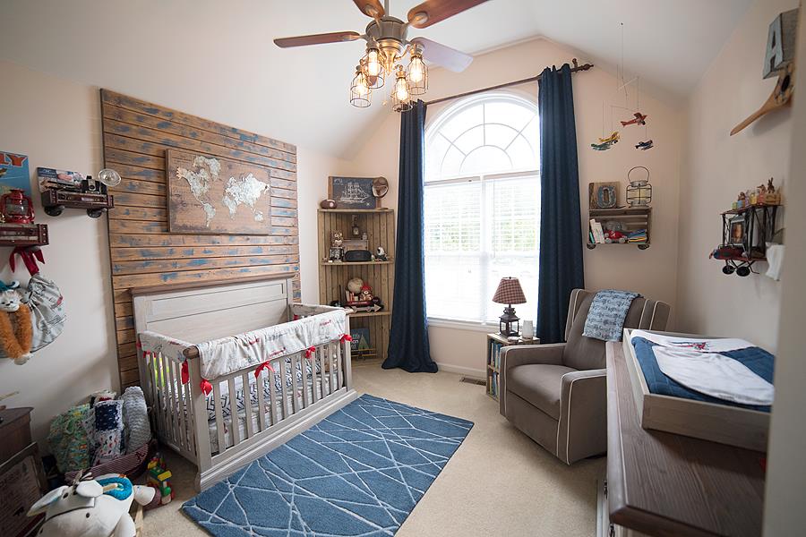597 Mortons Lake Road Manchester, TN 37355 - Photo 11 of 16 The little guy's room has high ceiling, fan, and nice closet. Wood piece behind the bed does not stay.