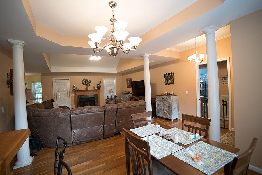 597 Mortons Lake Road Manchester, TN 37355 - Photo 3 of 16 This view shows how the formal Dining Room opens into the Living Room. Pretty columns to accent the dining and living areas.