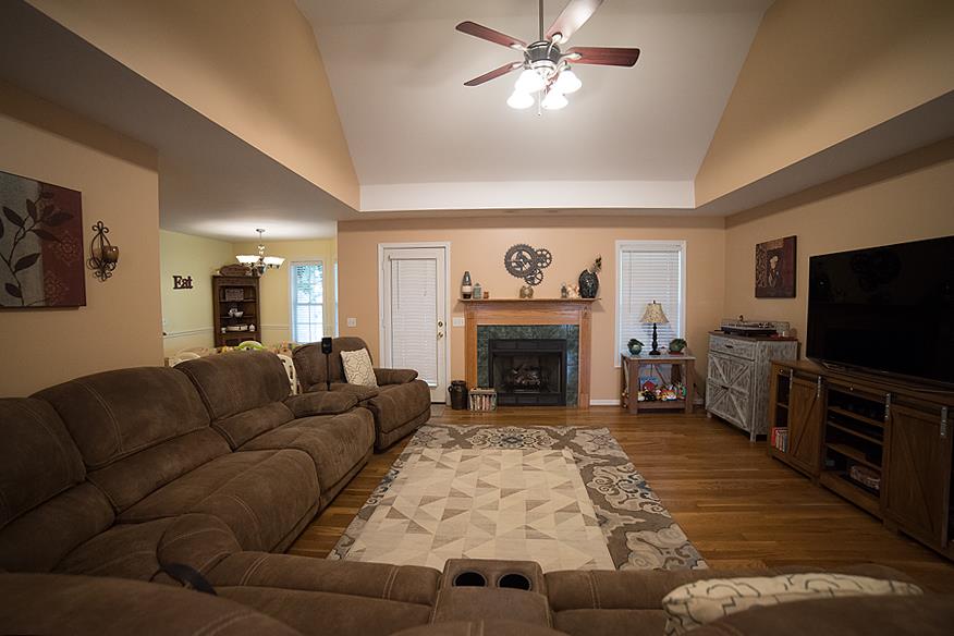 597 Mortons Lake Road Manchester, TN 37355 - Photo 5 of 16 Cozy natural gas FP for the winter time. Check out the TALL ceilings and the Shiny hardwood floors!!
