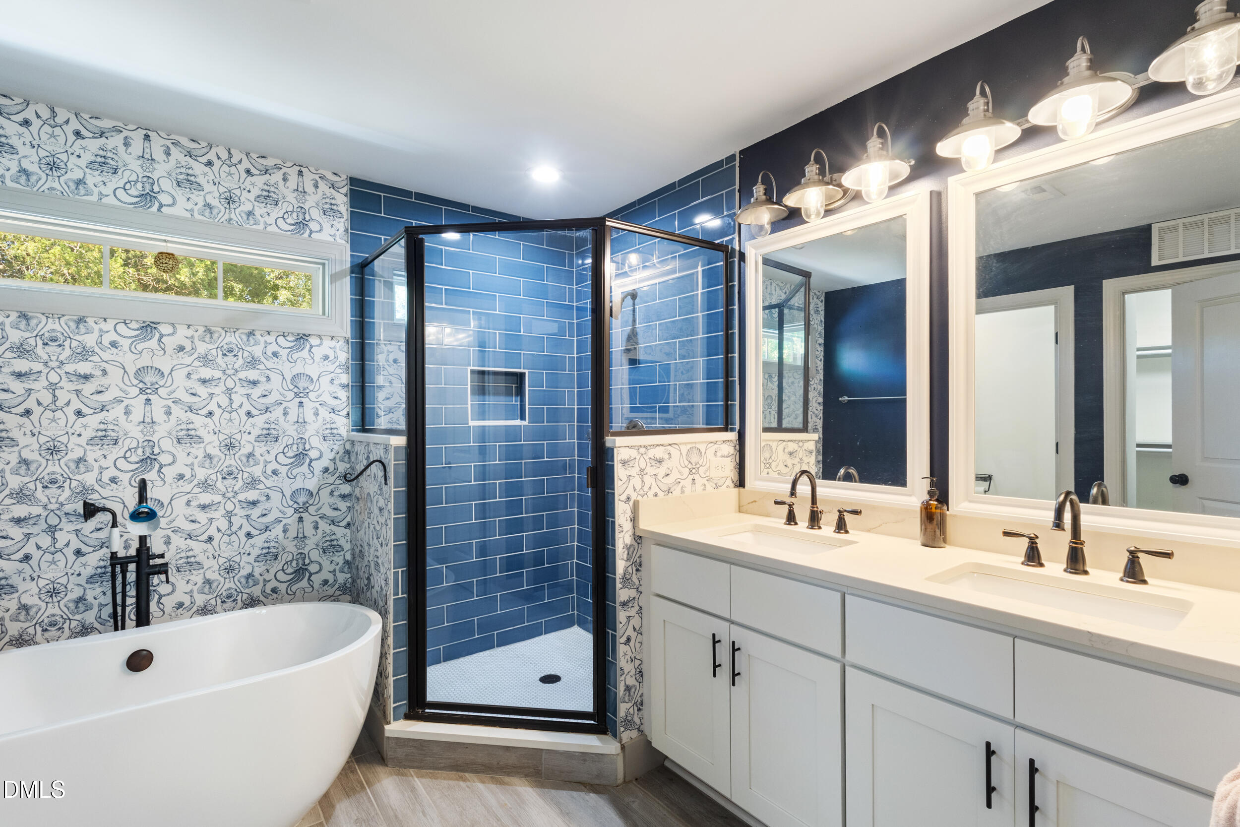 200 Lincoln Court Raleigh, NC 27610 - Photo 22 of 45 a bathroom with a double vanity sink mirror and bathtub