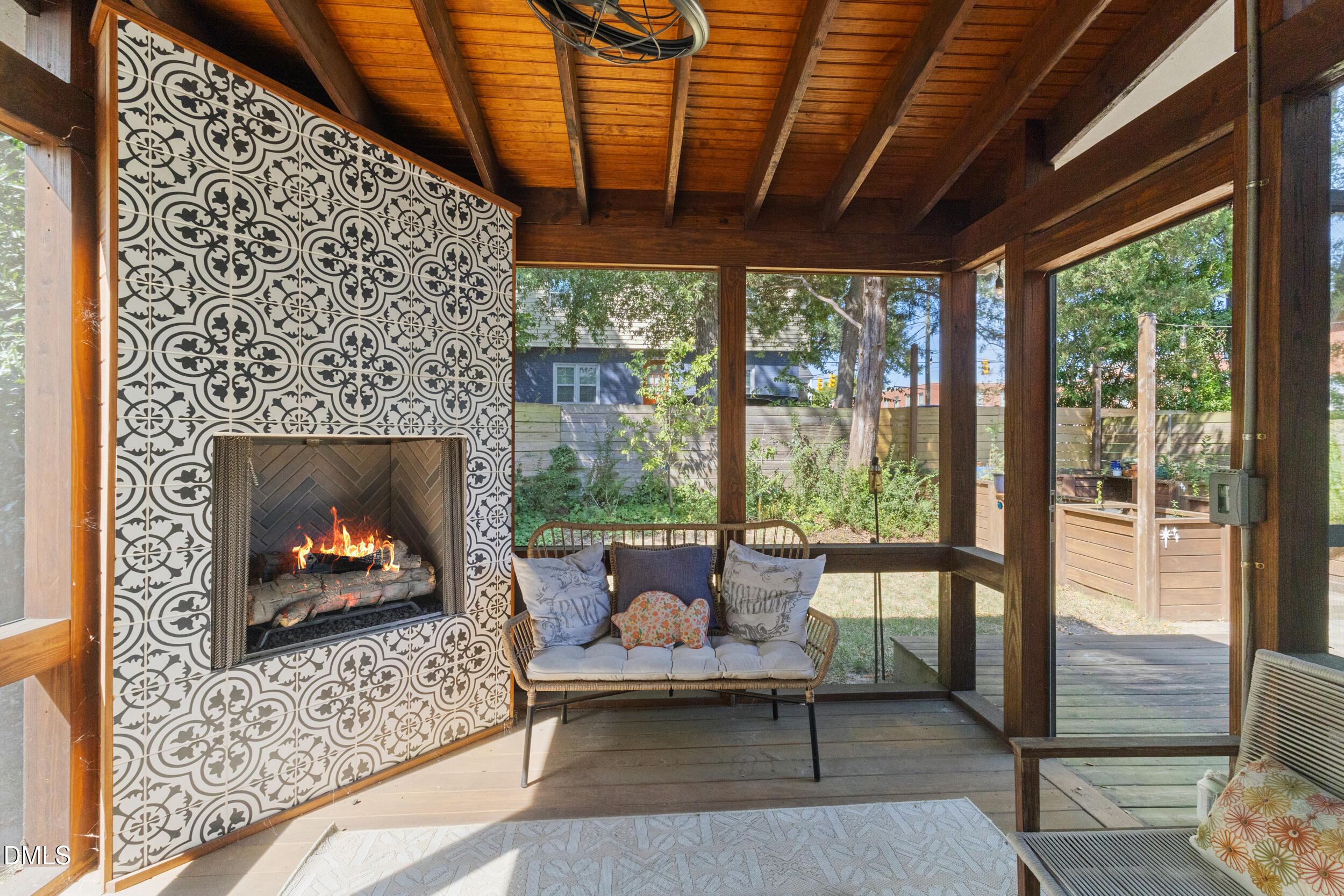 200 Lincoln Court Raleigh, NC 27610 - Photo 30 of 45 a living room with furniture a fireplace and a table
