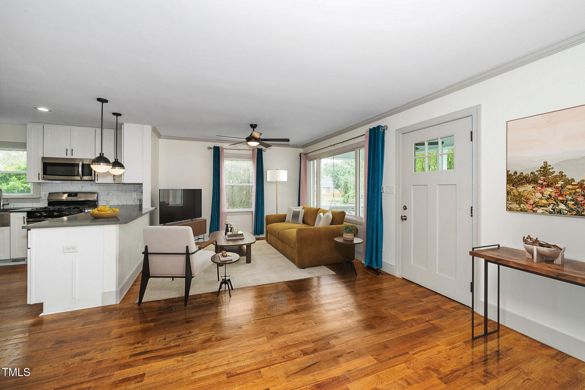 200 Lincoln Court Raleigh, NC 27610 - Photo 9 of 45 a living room with furniture and a wooden floor