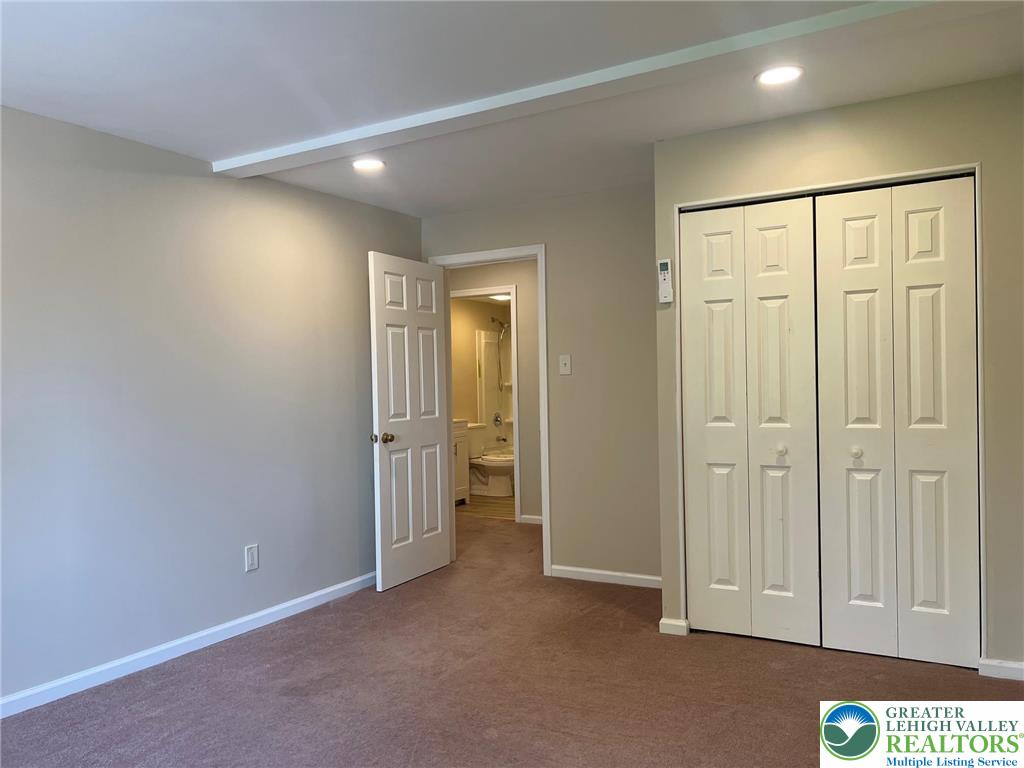 934 Bank Street Emmaus, PA 18049 - Photo 15 of 17 an empty room with windows and closet