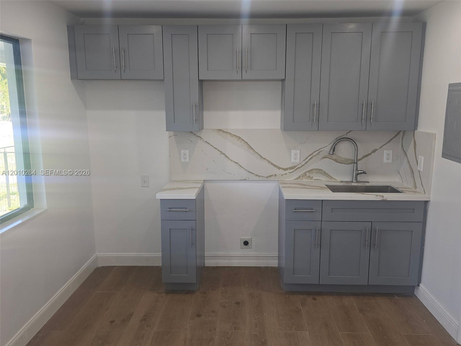 3300 Southeast 6th Street, Unit 2 Pompano Beach, FL 33062 - Photo 1 of 7 a view of storage and utility room with closet