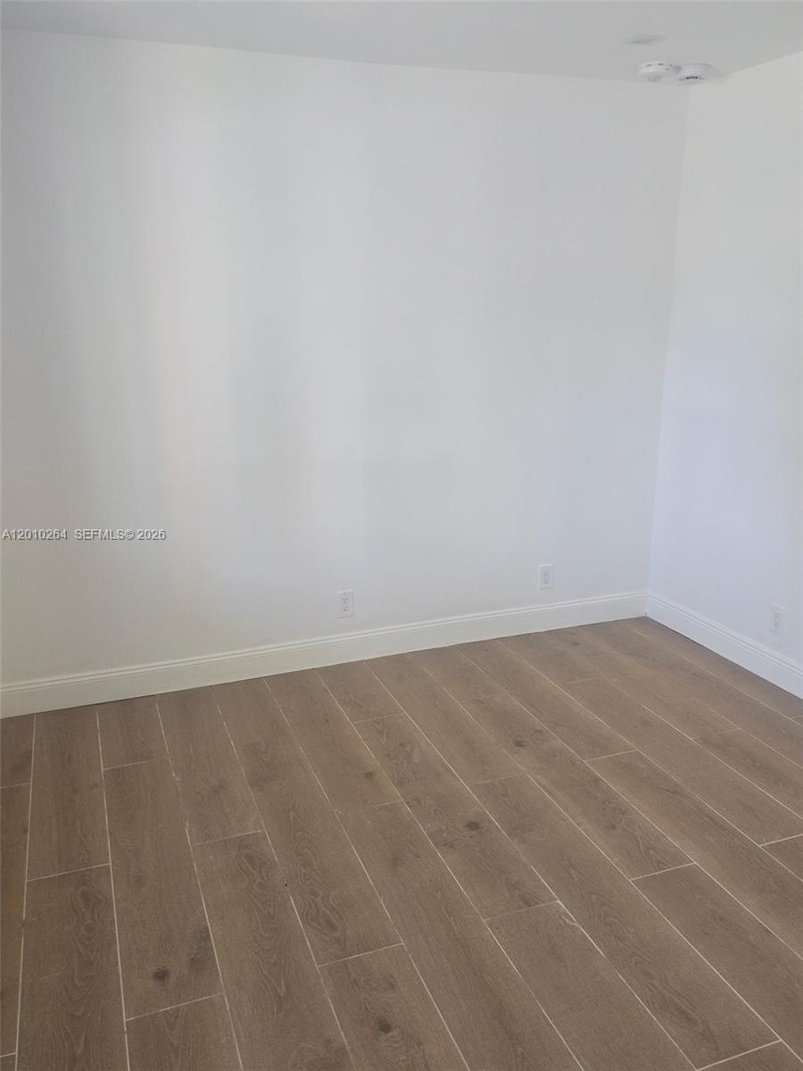 3300 Southeast 6th Street, Unit 2 Pompano Beach, FL 33062 - Photo 3 of 7 a view of an empty room