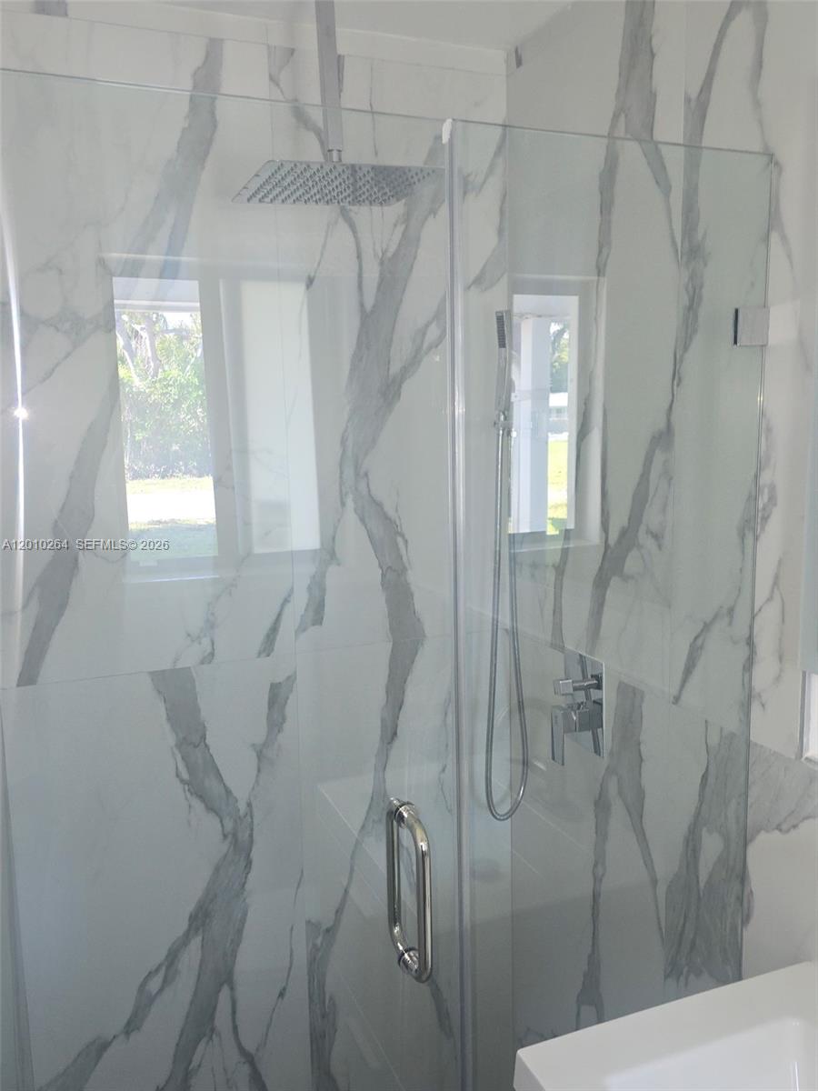 3300 Southeast 6th Street, Unit 2 Pompano Beach, FL 33062 - Photo 4 of 7 a bathroom with a shower