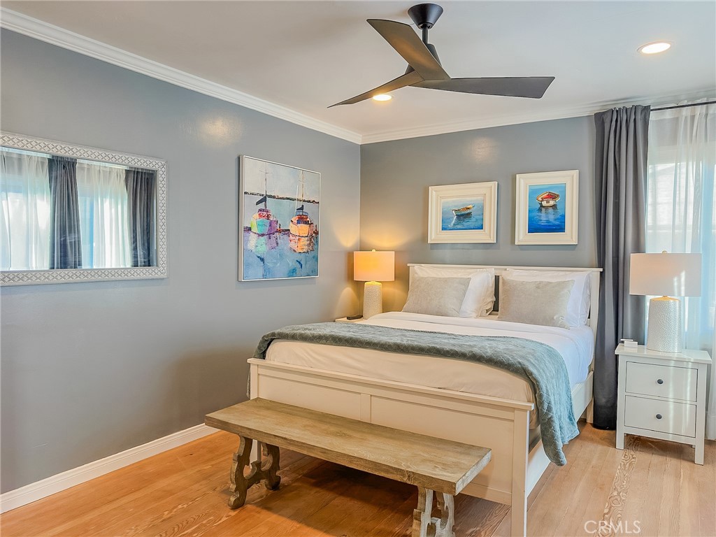 33922 Malaga Drive Dana Point, CA 92629 - Photo 14 of 22 a bedroom with a bed and a desk