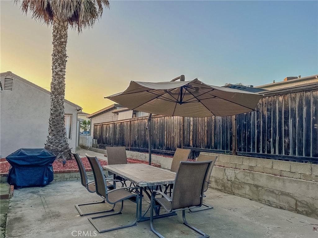 33922 Malaga Drive Dana Point, CA 92629 - Photo 22 of 22 a backyard of a house with table and chairs