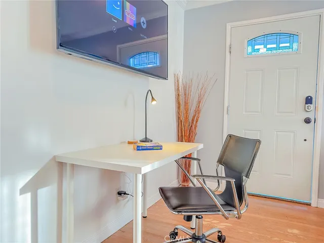 a view of a workspace with furniture