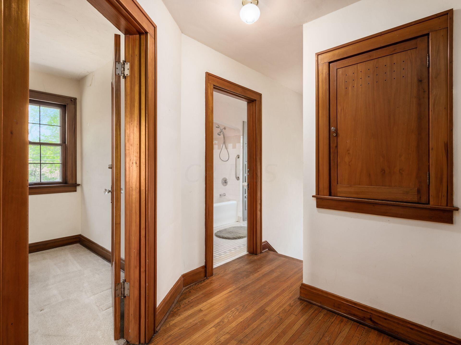 1974 Chatfield Road Columbus, OH 43221 - Photo 35 of 48 Hallway with built in storage cabinet