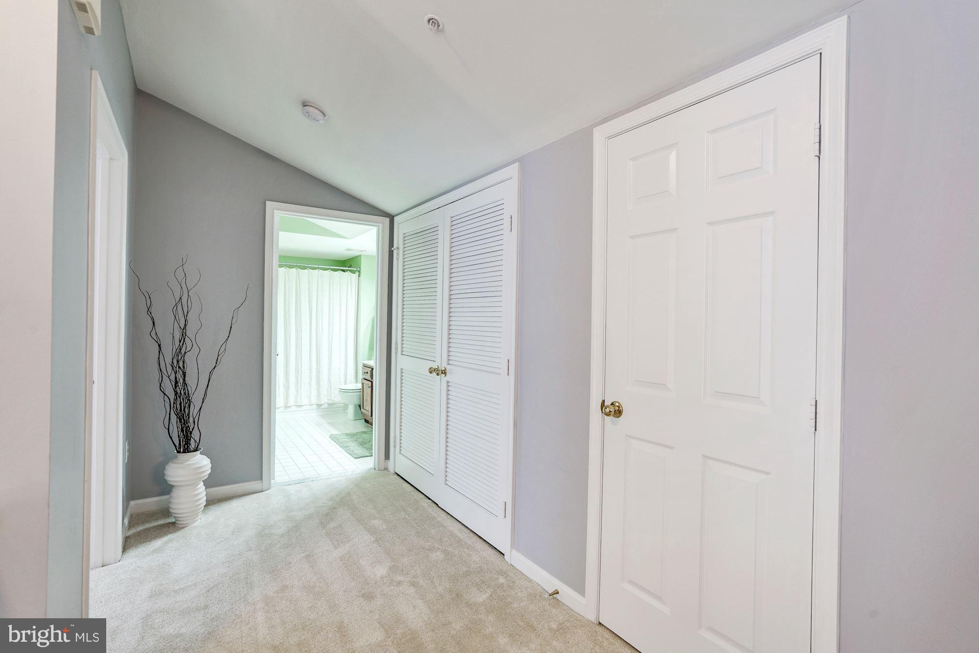 11408 Gate Hill Place, Unit 116 Reston, VA 20194 - Photo 19 of 28 a view of an empty room and a window