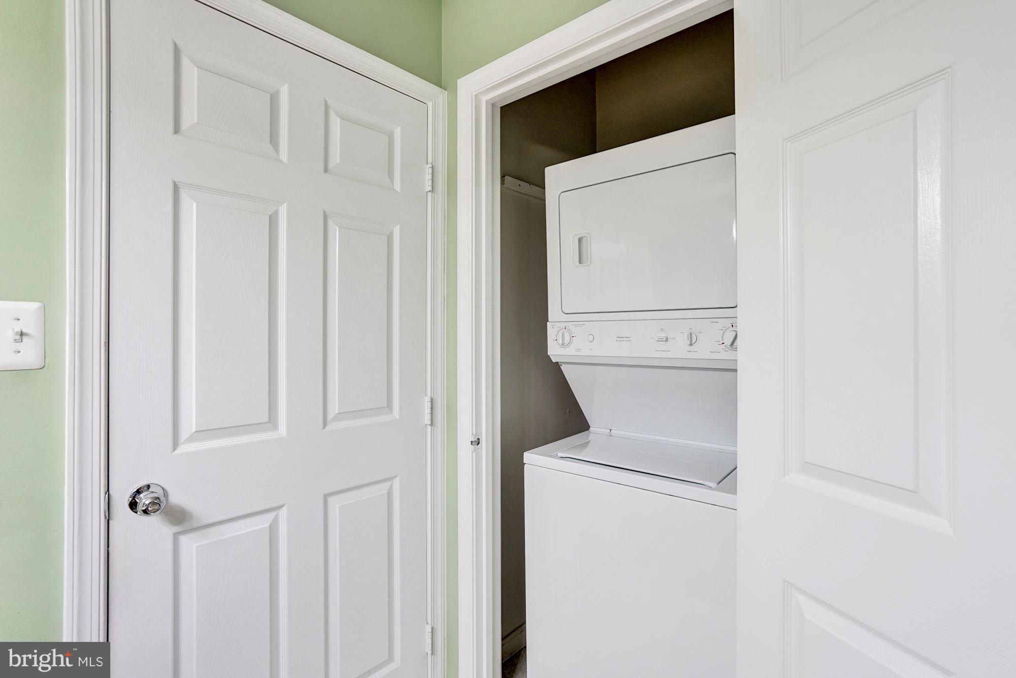 11408 Gate Hill Place, Unit 116 Reston, VA 20194 - Photo 20 of 28 a utility room with dryer and washer