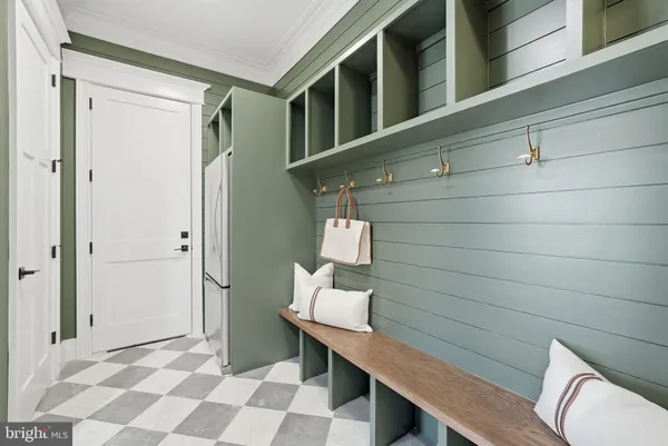 a bathroom with a sink mirror and toilet