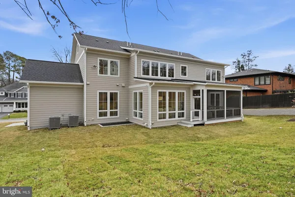 a view of a large building with a big yard
