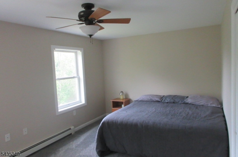 28 Beaver Run Road Lafayette, NJ 07848 - Photo 19 of 36 a bedroom with a bed and a window