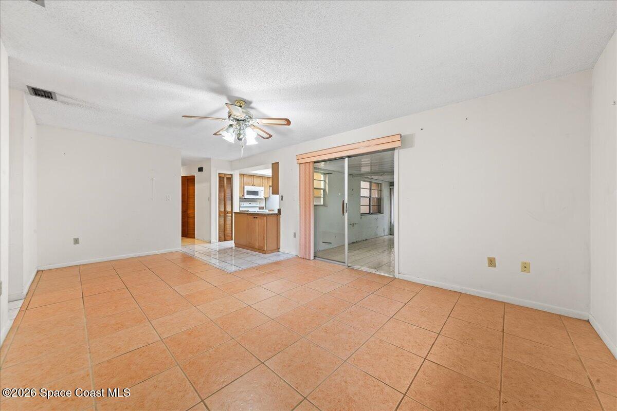 2066 Acacia Street Northeast Palm Bay, FL 32905 - Photo 12 of 28 a view of an empty room with a window