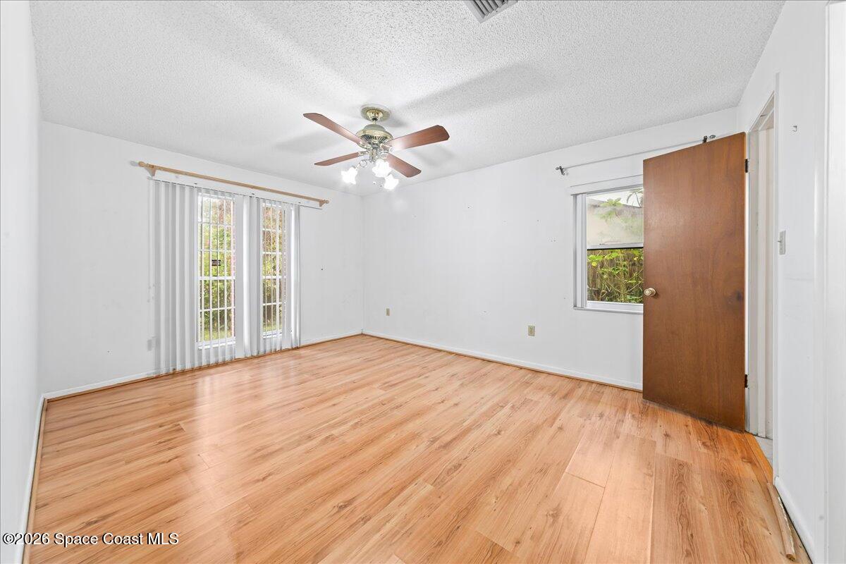 2066 Acacia Street Northeast Palm Bay, FL 32905 - Photo 21 of 28 a view of an empty room with a window