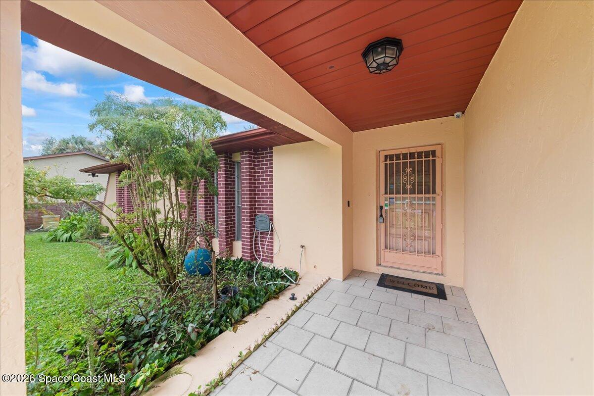 2066 Acacia Street Northeast Palm Bay, FL 32905 - Photo 5 of 28 a view of house with backyard