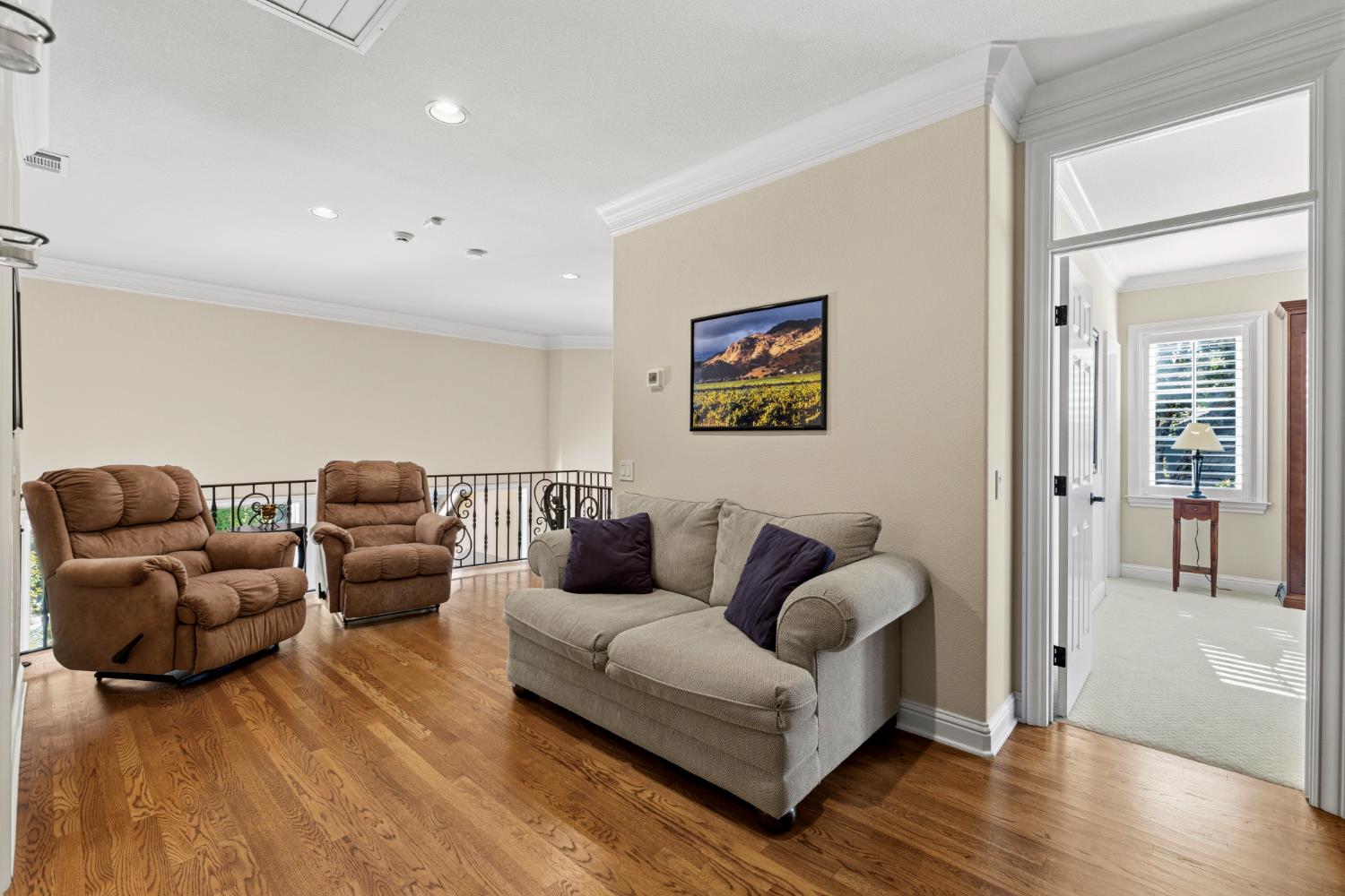 5869 Granite Hills Drive South Granite Bay, CA 95746 - Photo 39 of 66 a living room with furniture and a wooden floor