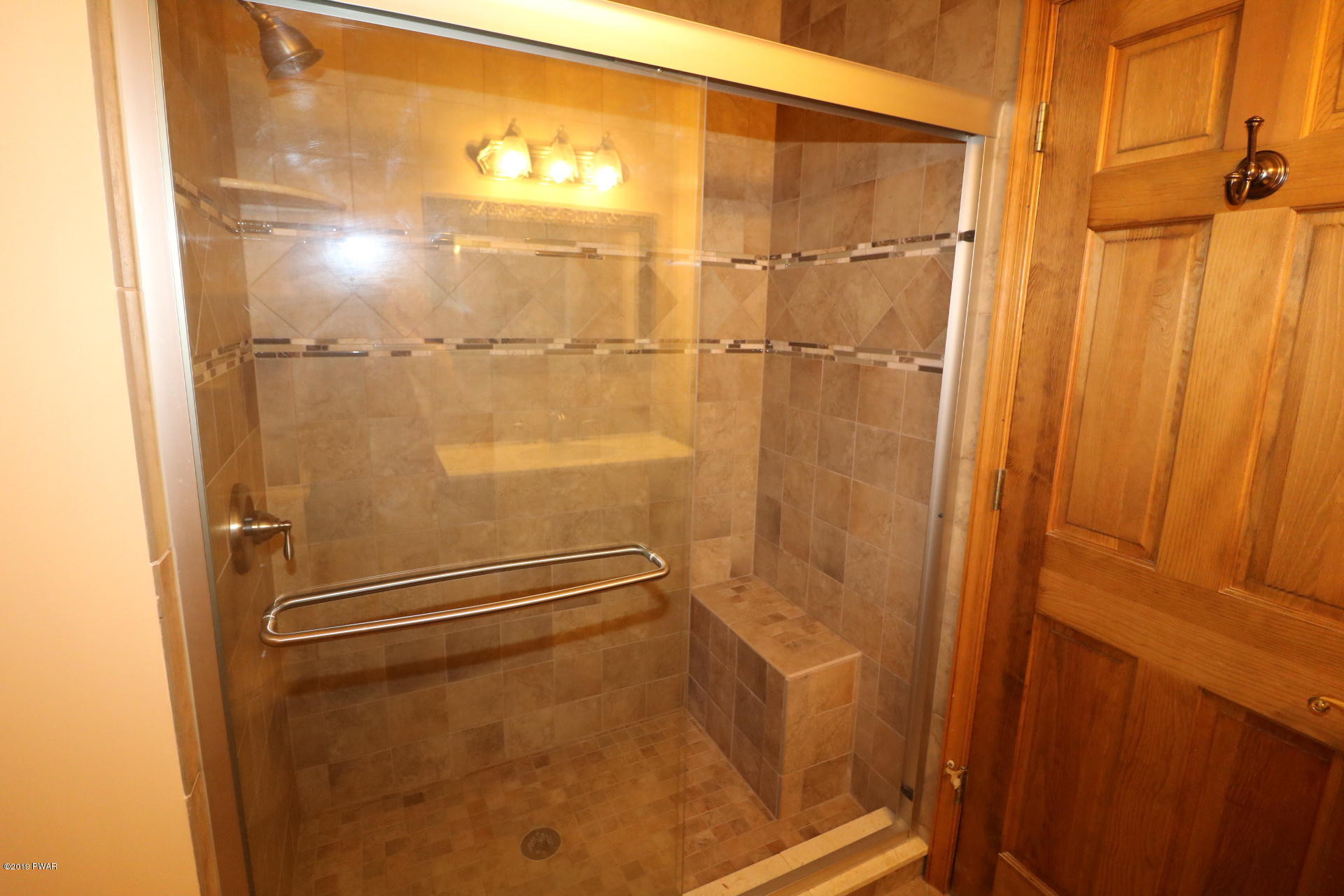 53 Savitz Road Lake Ariel, PA 18436 - Photo 43 of 53 a bathroom with a glass shower door