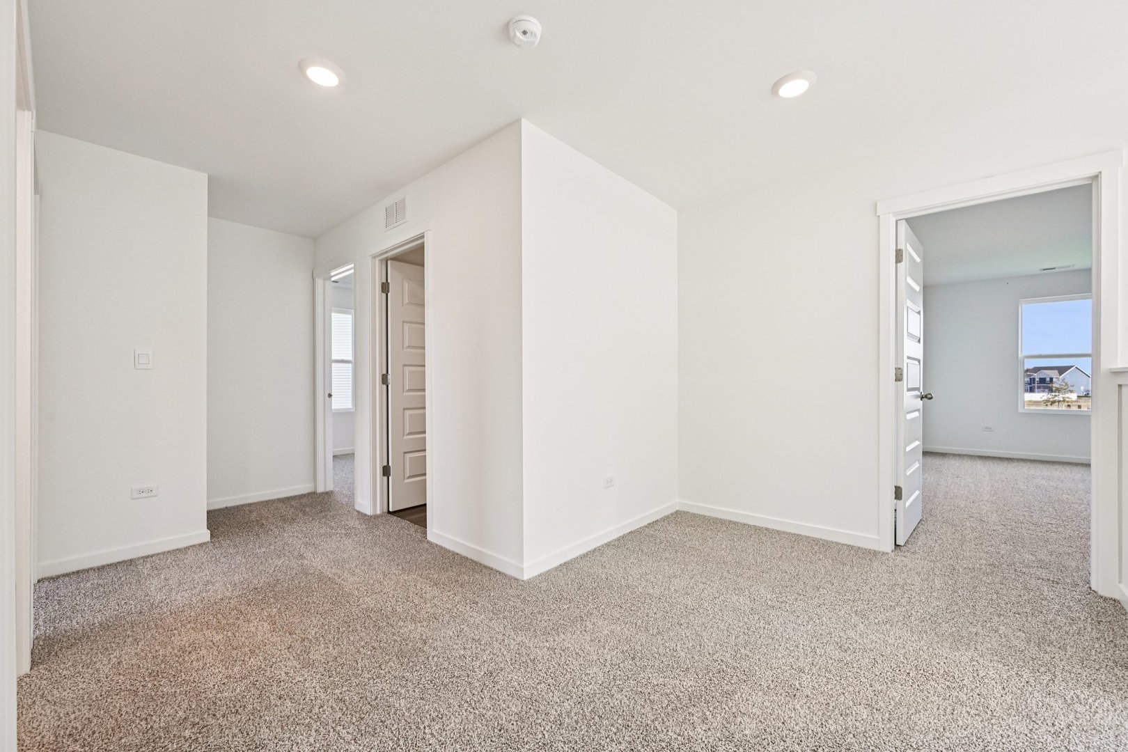 3006 Old Castle Road Joliet, IL 60431 - Photo 18 of 37 an empty room with a empty space and a hallway