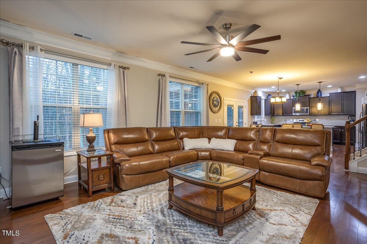 7656 Channery Way Raleigh, NC 27616 - Photo 18 of 44 a living room with furniture and a large window