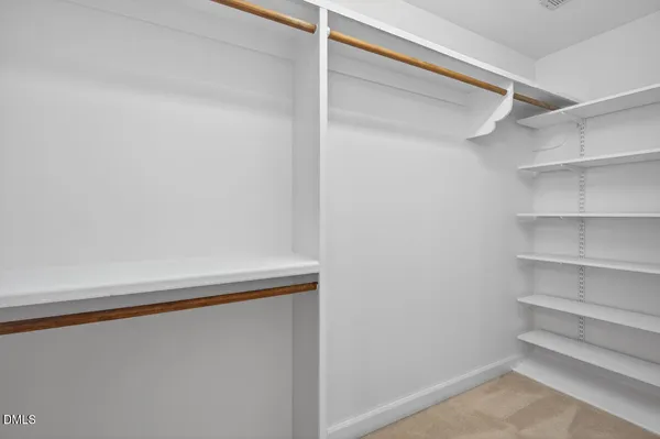 a view of a backyard with a sitting area