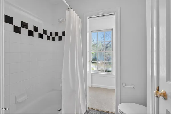 an aerial view of a house with outdoor space