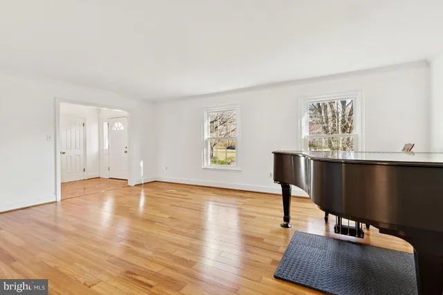 a view of workspace with wooden floor
