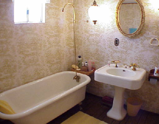 335 Zolezzi Lane Reno, NV 89511 - Photo 1 of 3 a bathroom with a sink and a mirror